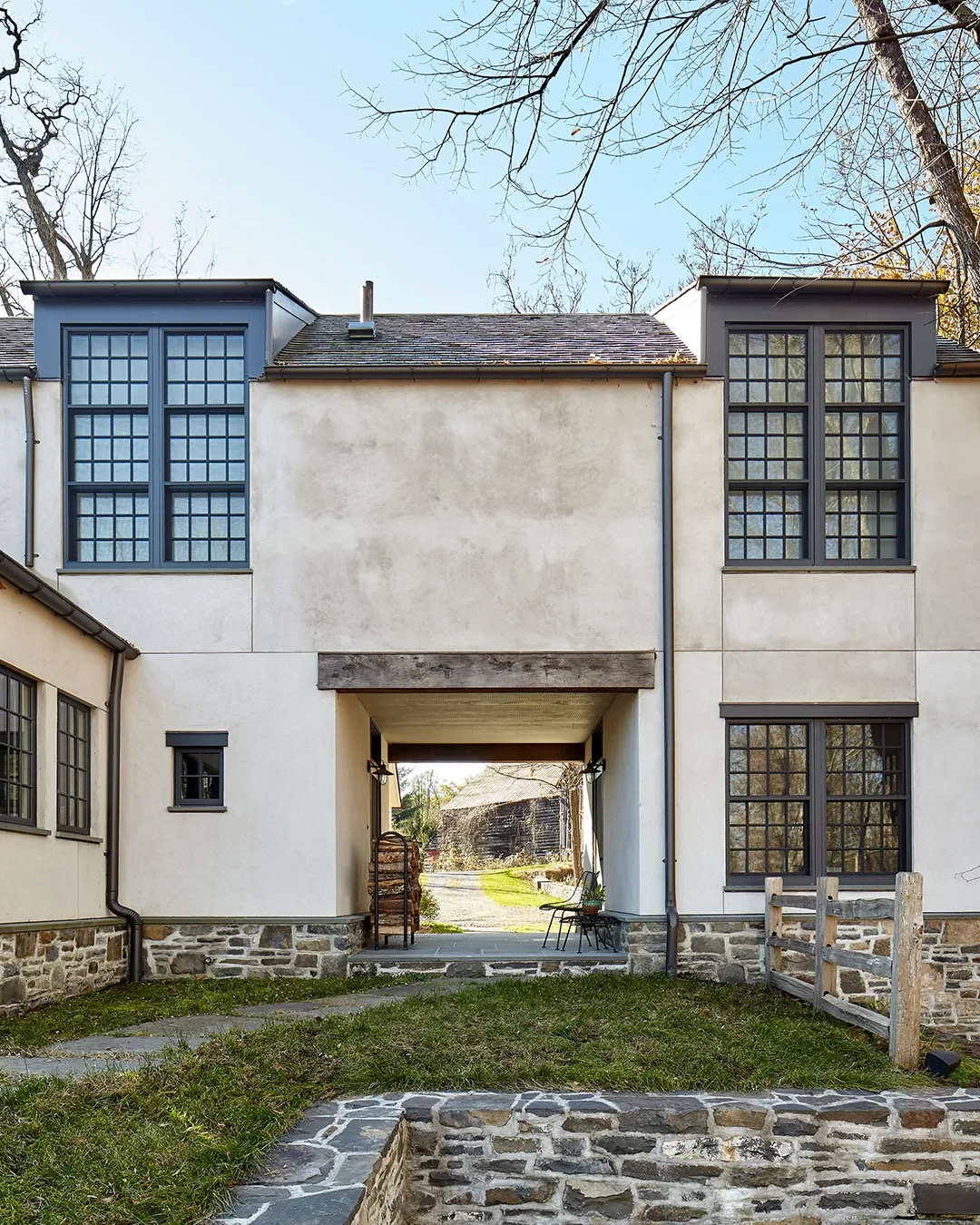 A Stone Farmhouse, Civil War–Era Addition, and Stucco New Build Come Together in the Hudson Valley