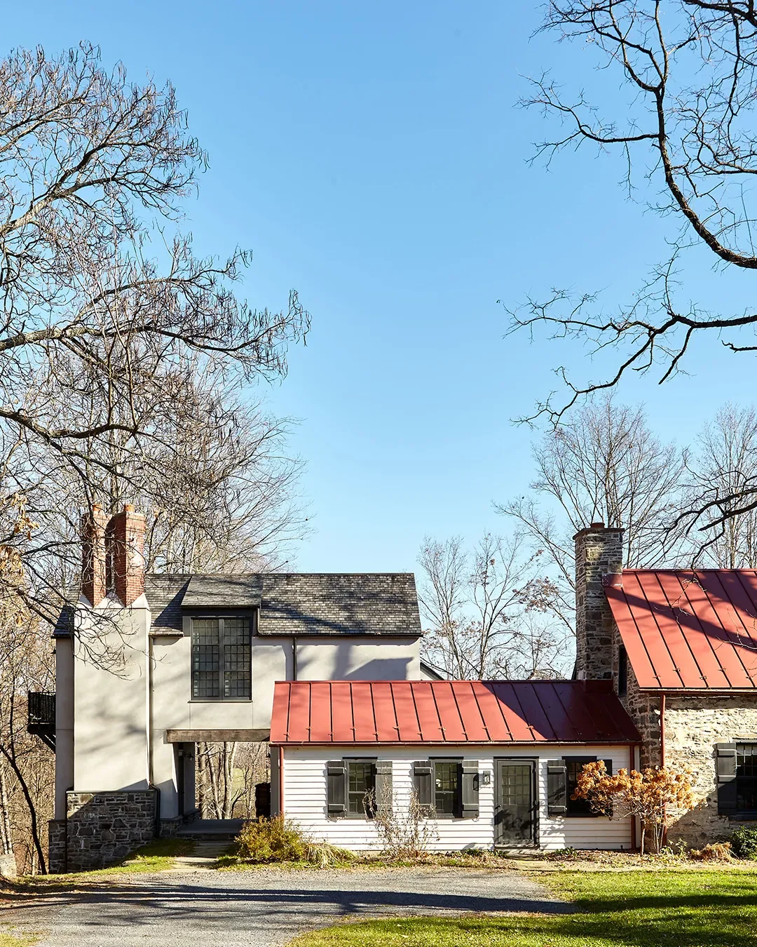 A Stone Farmhouse, Civil War–Era Addition, and Stucco New Build Come Together in the Hudson Valley