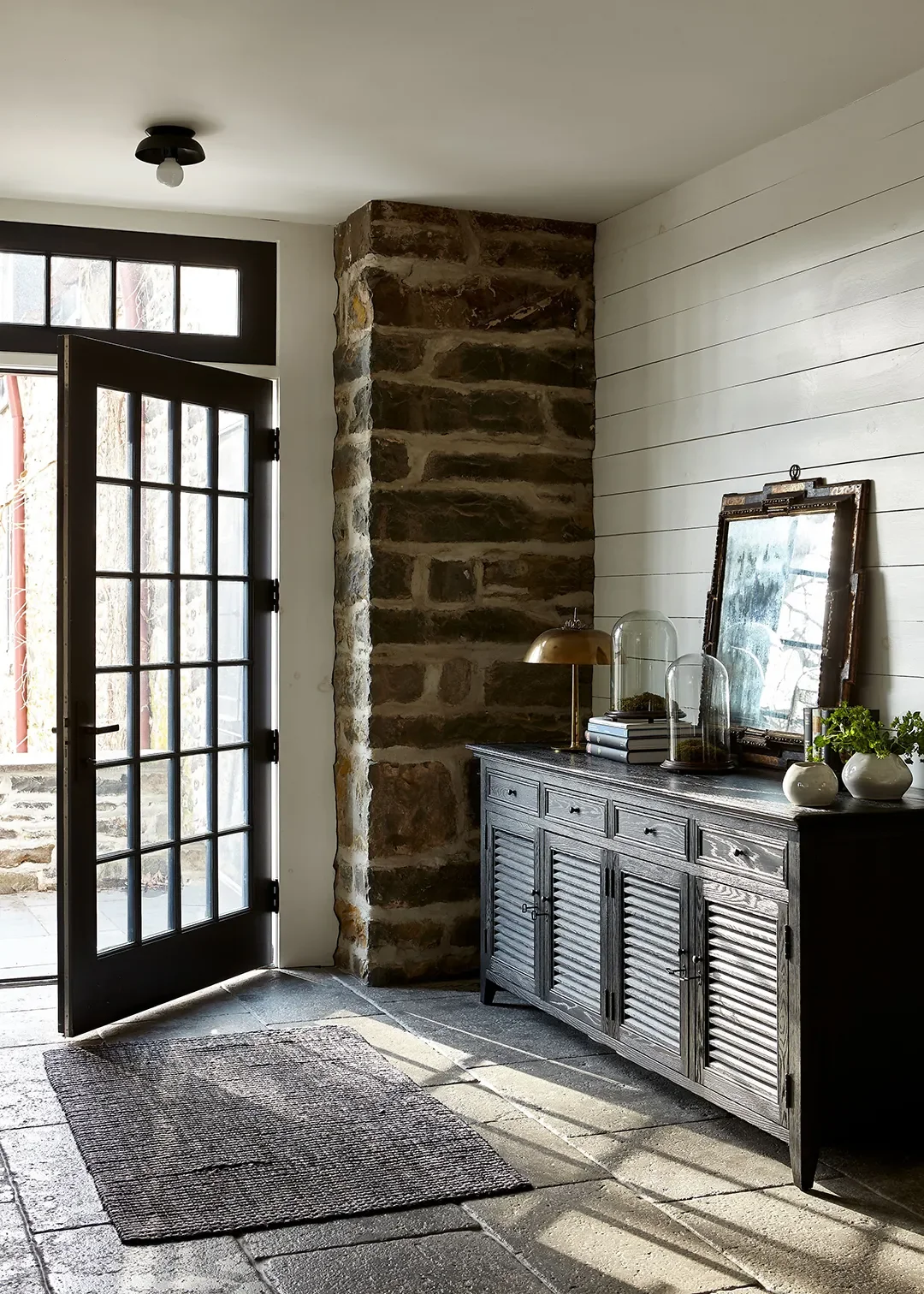 A Stone Farmhouse, Civil War–Era Addition, and Stucco New Build Come Together in the Hudson Valley